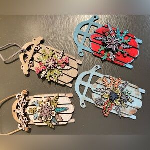 Handmade and painted wooden sly ornaments.